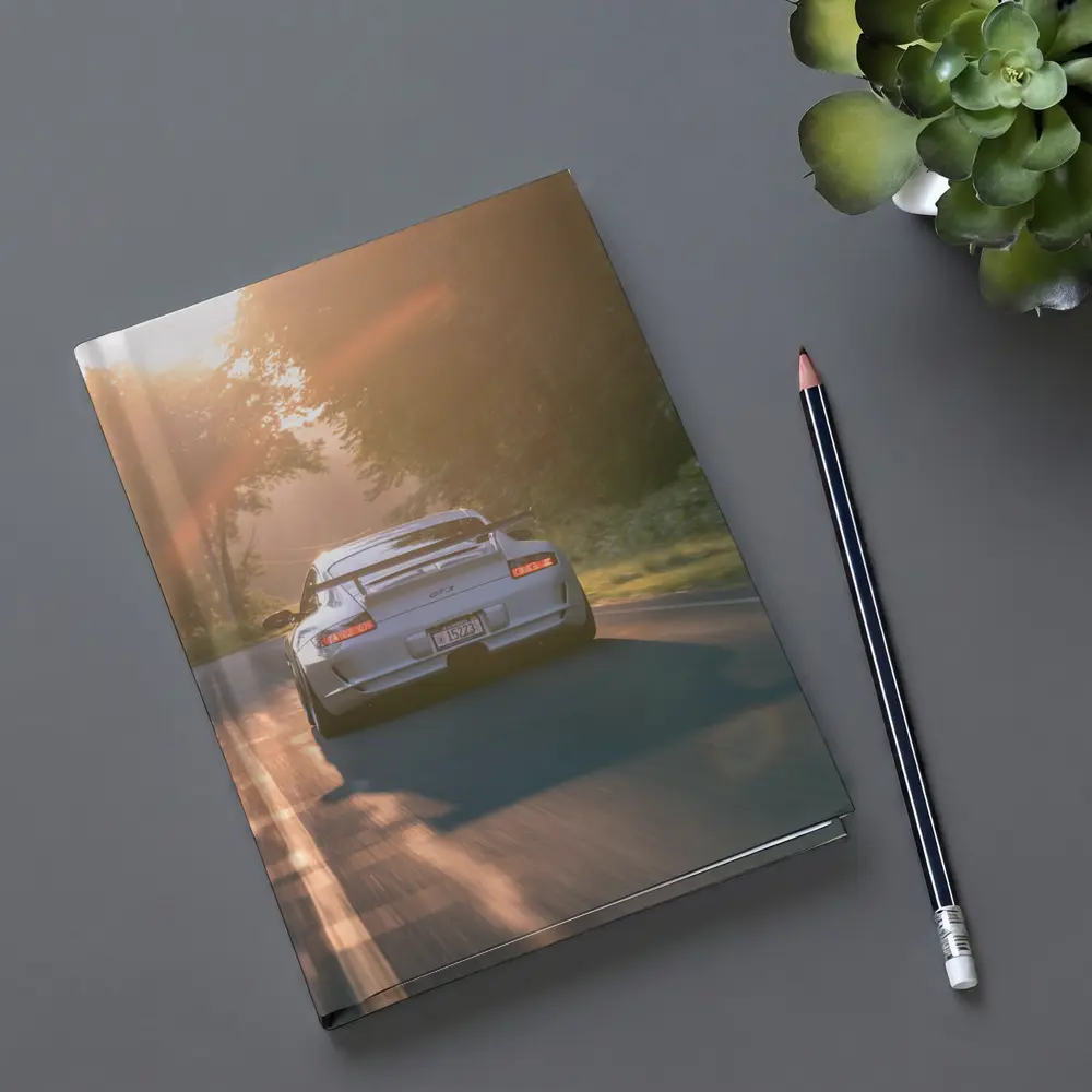 Porsche GT3 Driving Sunlit Country Road – Notebooks
