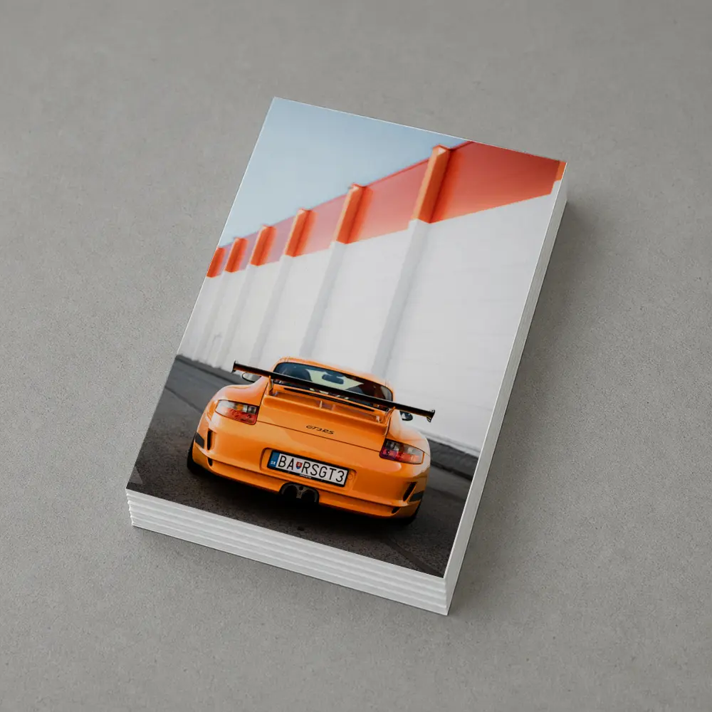 Porsche GT3 RS Orange Against Industrial Wall – Postcards