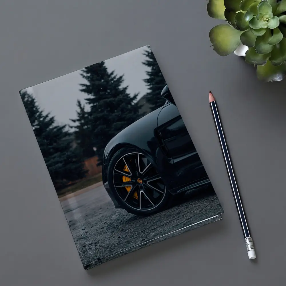 Black Porsche Taycan Yellow Calipers Moody Sky – Notebooks