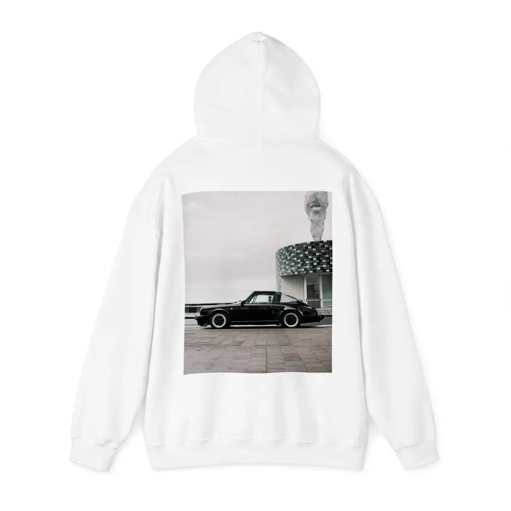Black Porsche 911 Parked by Coastal Building – Hoodies