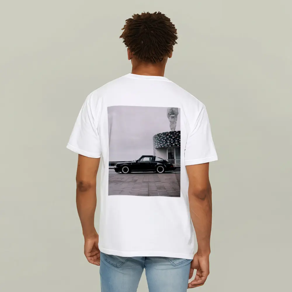 Black Porsche 911 Parked by Coastal Building – T-Shirts