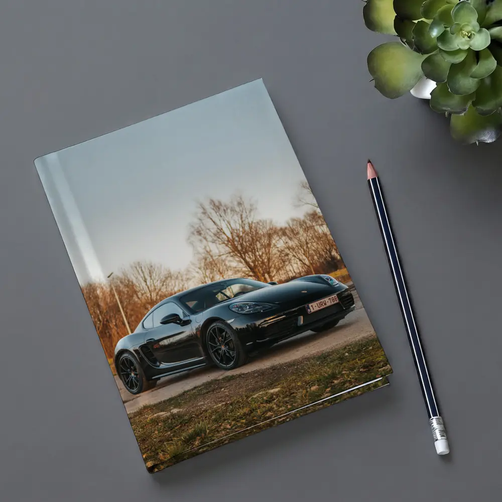 Black Porsche Cayman Parked Outdoors Autumn Trees – Notebooks