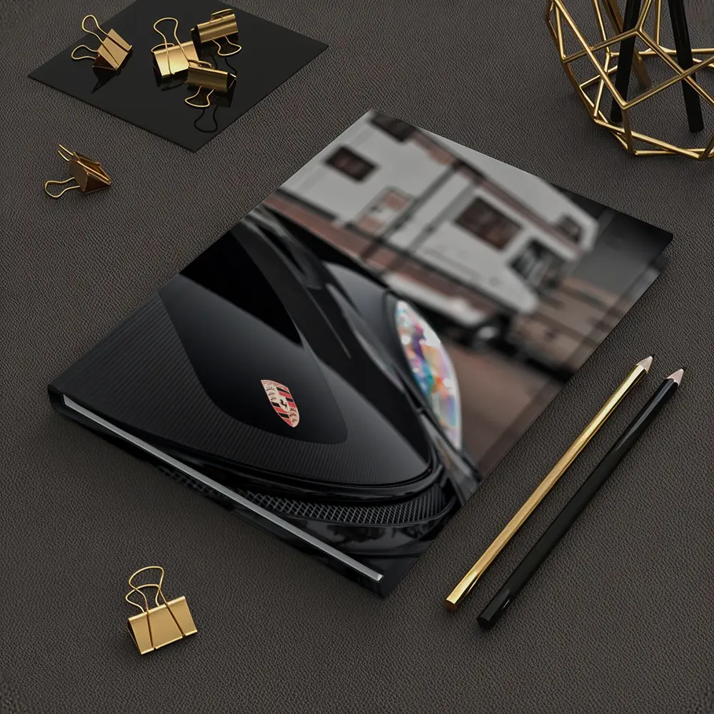 Porsche Black Hood Crest Close Up – Notebooks
