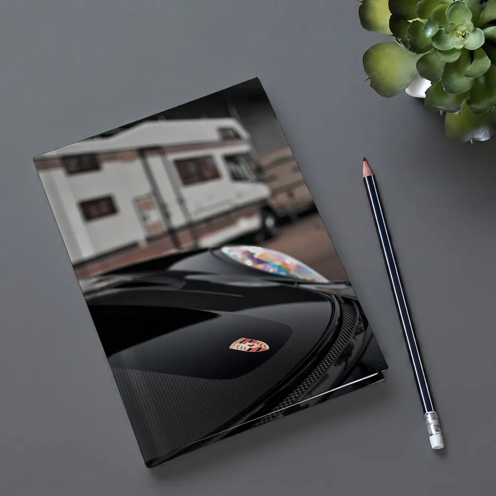 Porsche Black Hood Crest Close Up – Notebooks