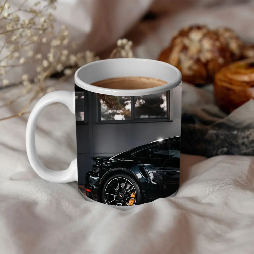 Black Porsche 911 Parked Near Building – Mugs