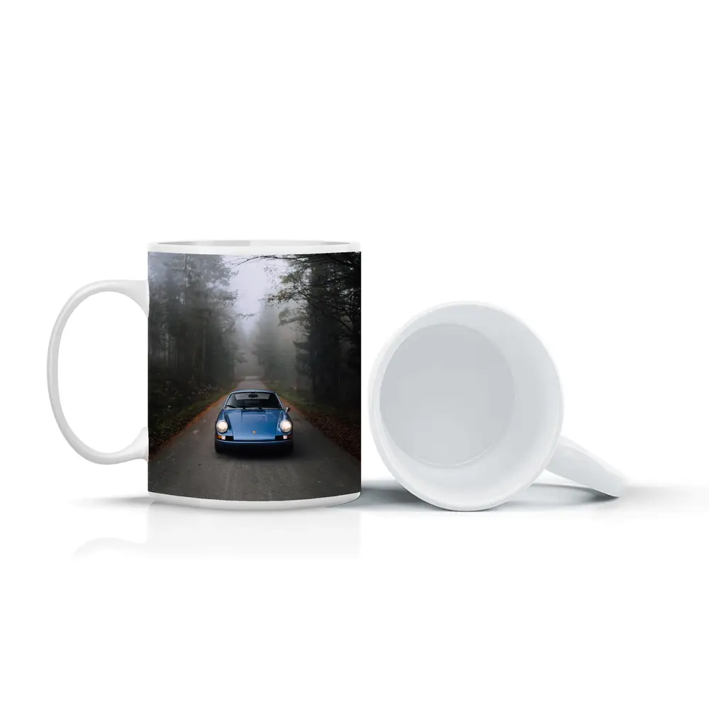 Blue Porsche 911 on Foggy Forest Road – Mugs