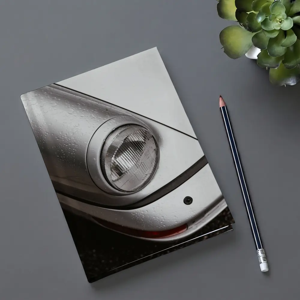 Porsche 911 Headlight Close Up Rainy Day – Notebooks