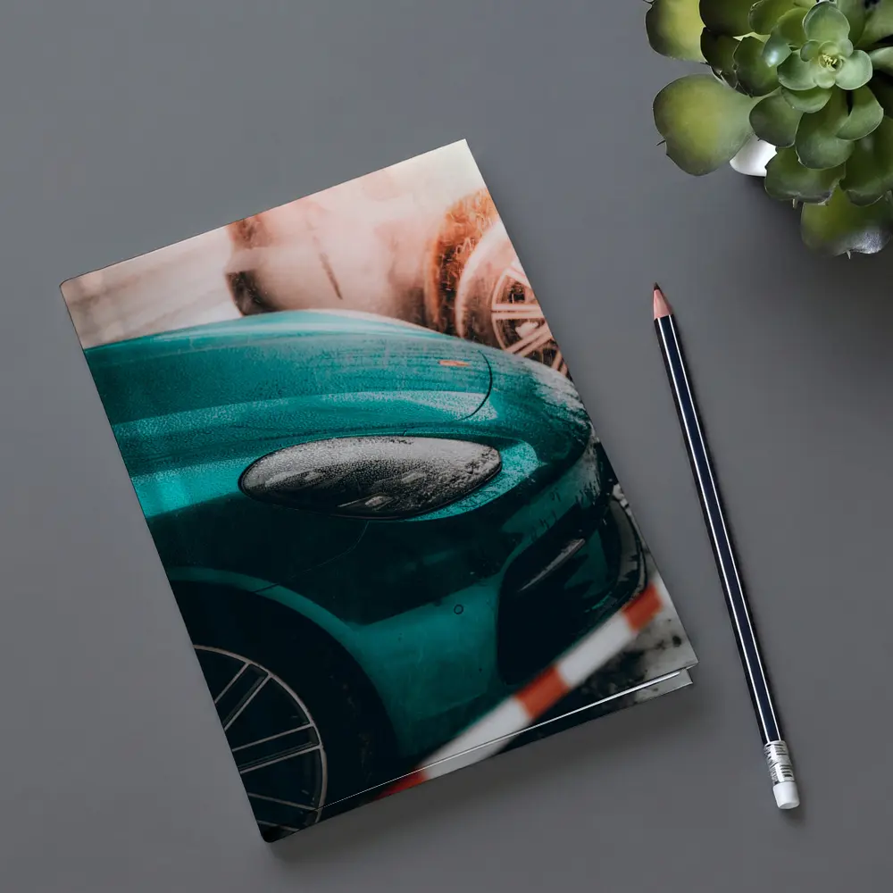 Teal Porsche Cayman At Snowy Car Wash – Notebooks