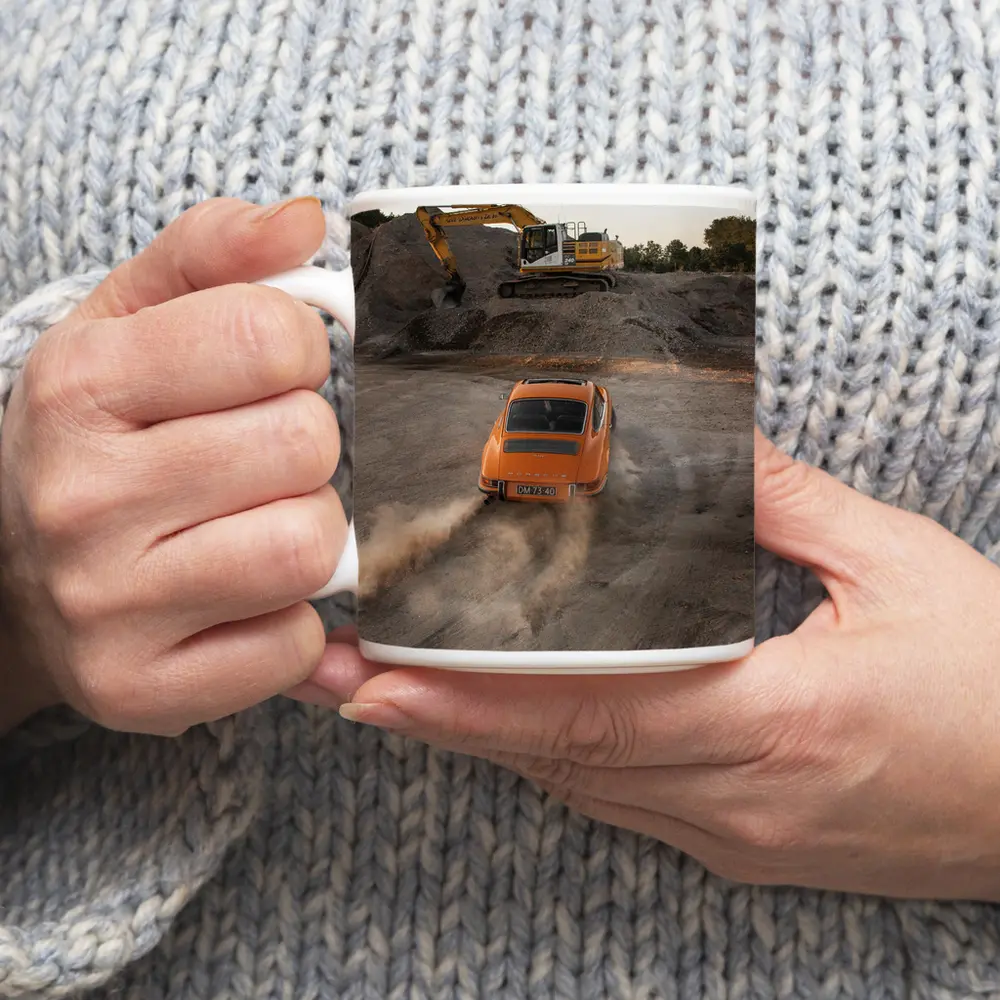 Orange Porsche 911 Drifting Dusty Gravel Quarry – Mugs