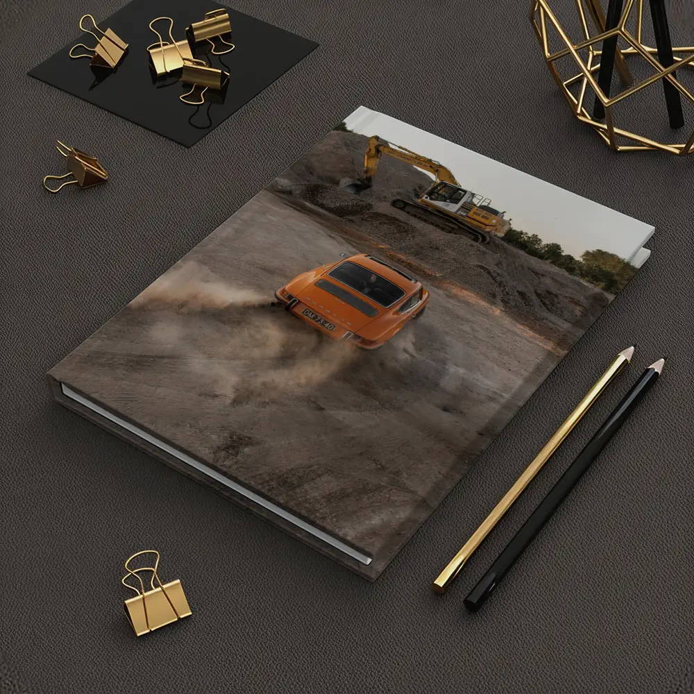Orange Porsche 911 Drifting Dusty Gravel Quarry – Notebooks