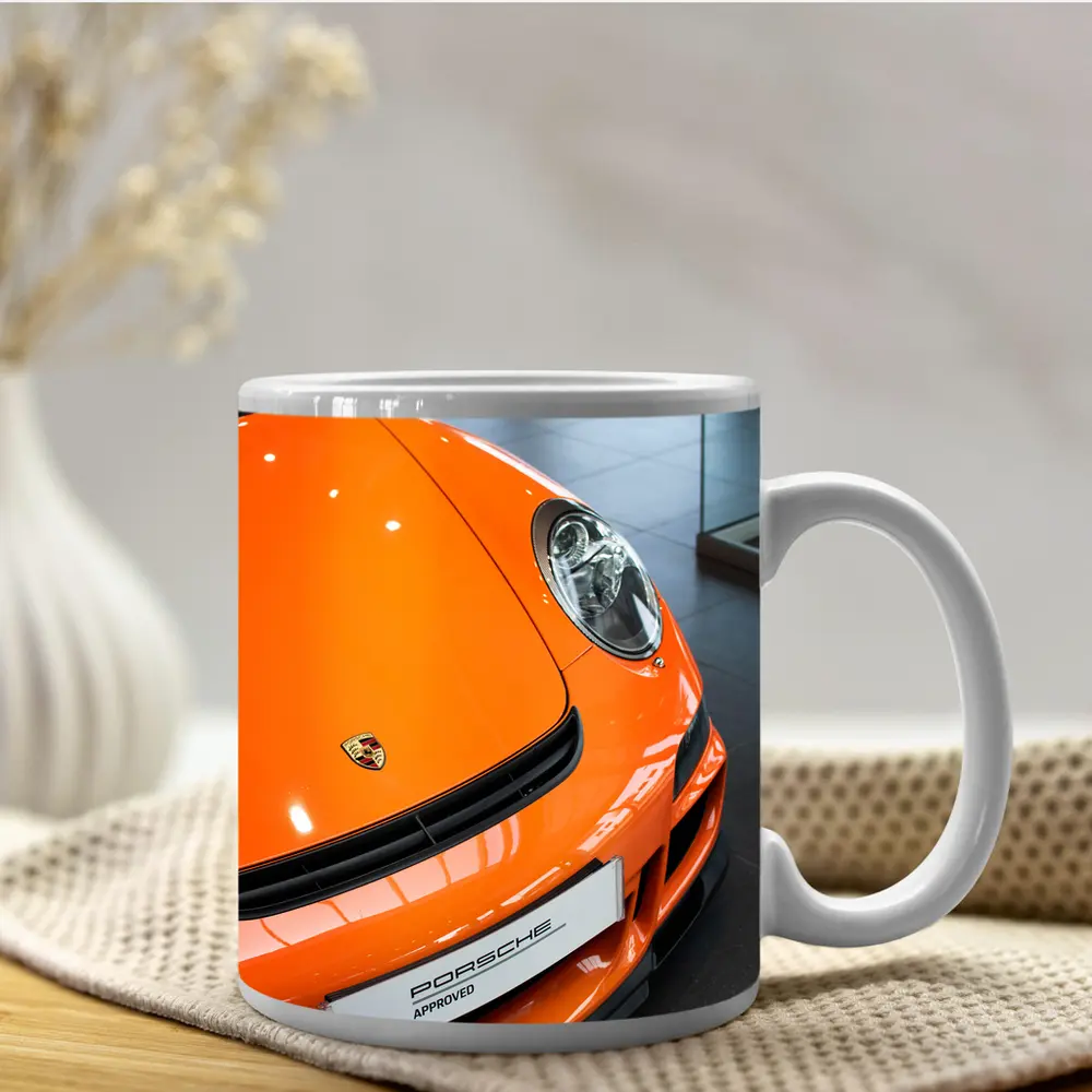 Porsche 911 Orange Front Dealership Interior – Mugs
