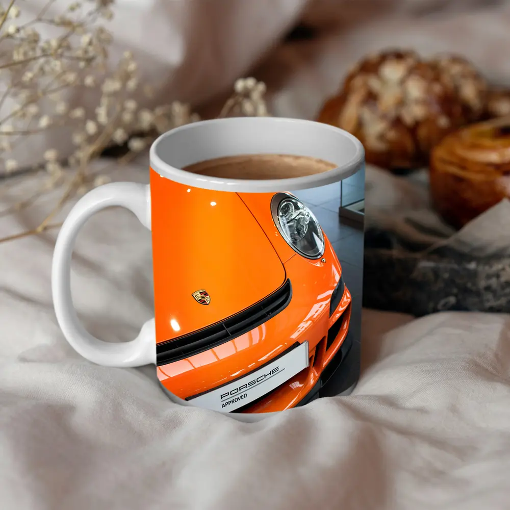 Porsche 911 Orange Front Dealership Interior – Mugs