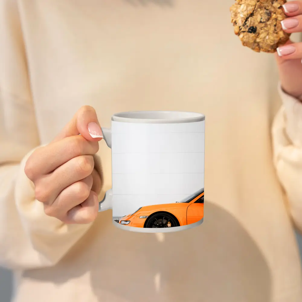 Orange Porsche GT3 Against White Wall – Mugs