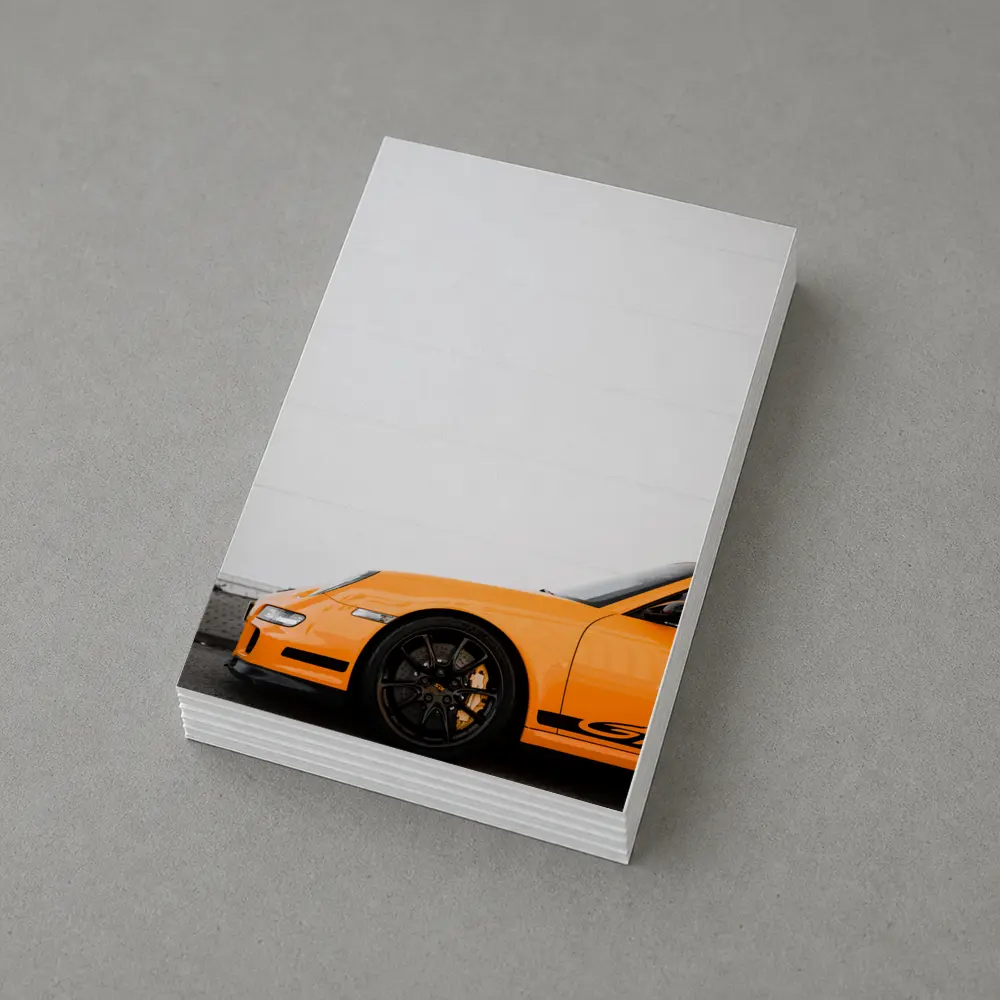 Orange Porsche GT3 Against White Wall – Postcards