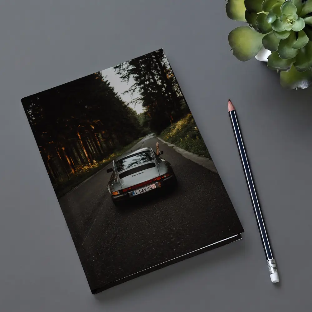 Porsche 911 Carrera on Forest Road – Notebooks