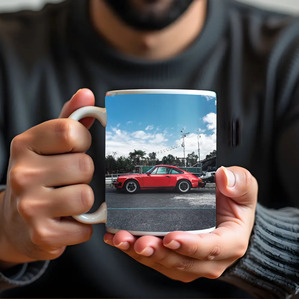 Red Porsche 911 Parked Under Blue Sky – Mugs
