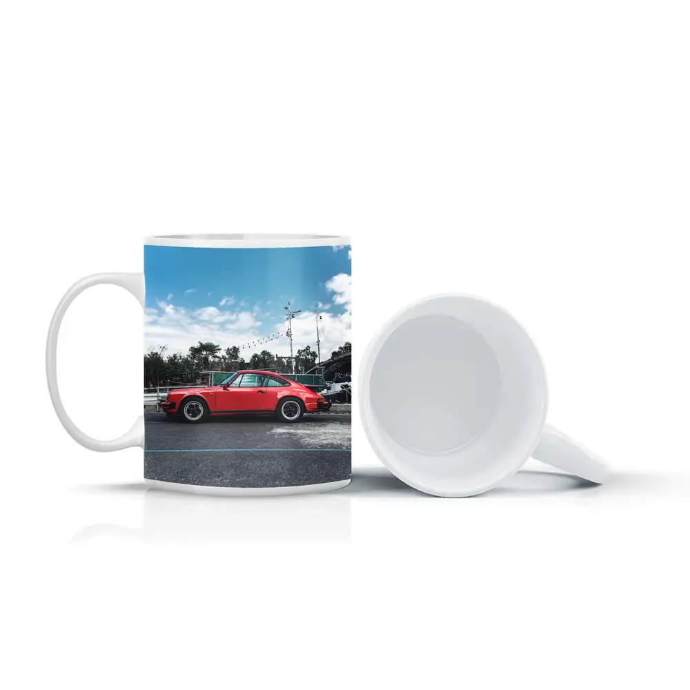 Red Porsche 911 Parked Under Blue Sky – Mugs