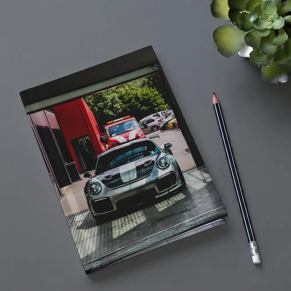 Porsche GT2 RS Silver Inside Garage – Notebooks