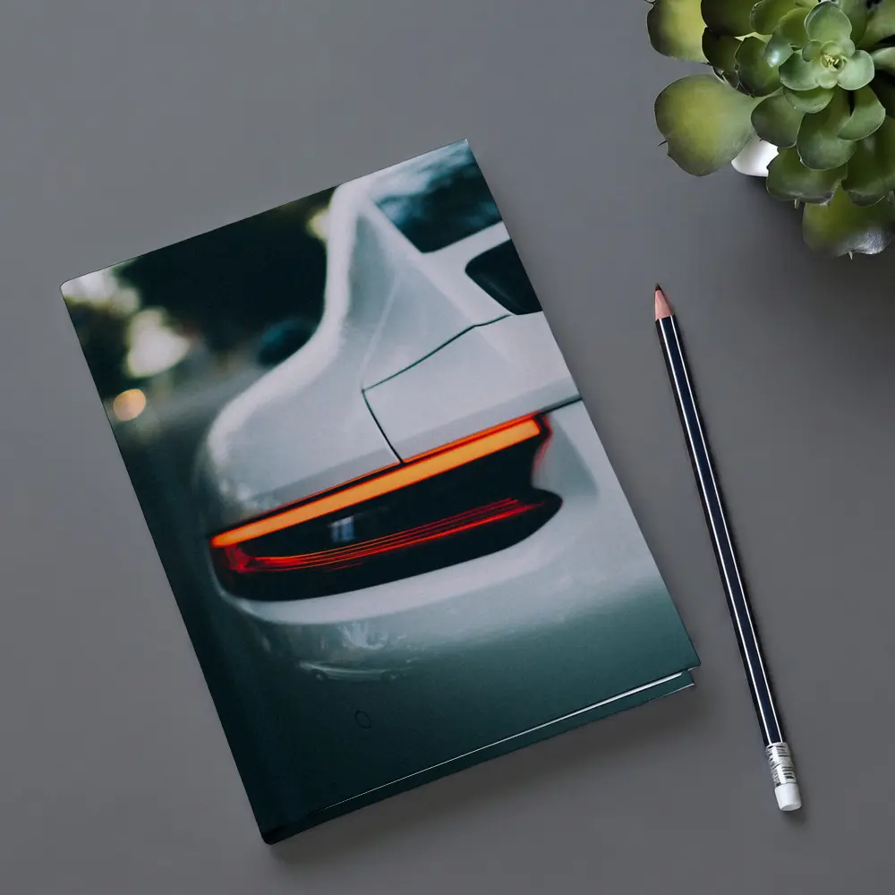 Porsche 911 Tail Light Close Up Shot – Notebooks