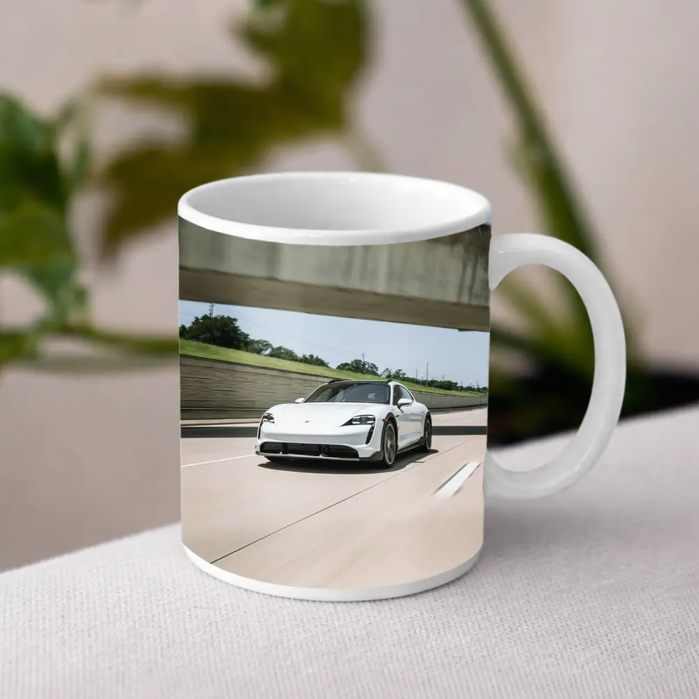 Porsche Taycan White on Open Highway – Mugs