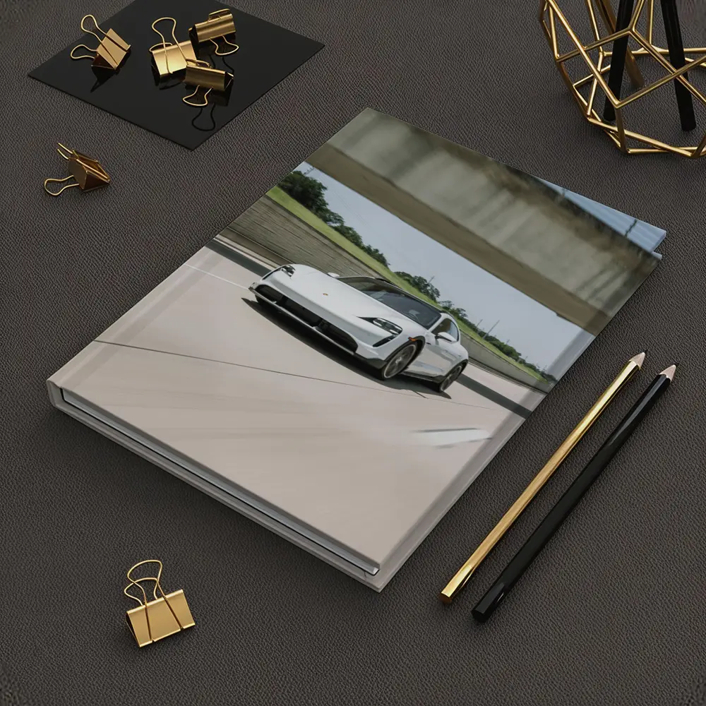 Porsche Taycan White on Open Highway – Notebooks