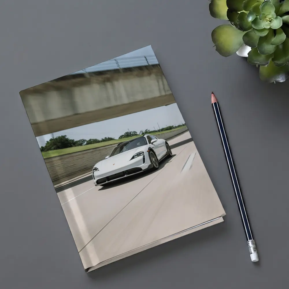 Porsche Taycan White on Open Highway – Notebooks