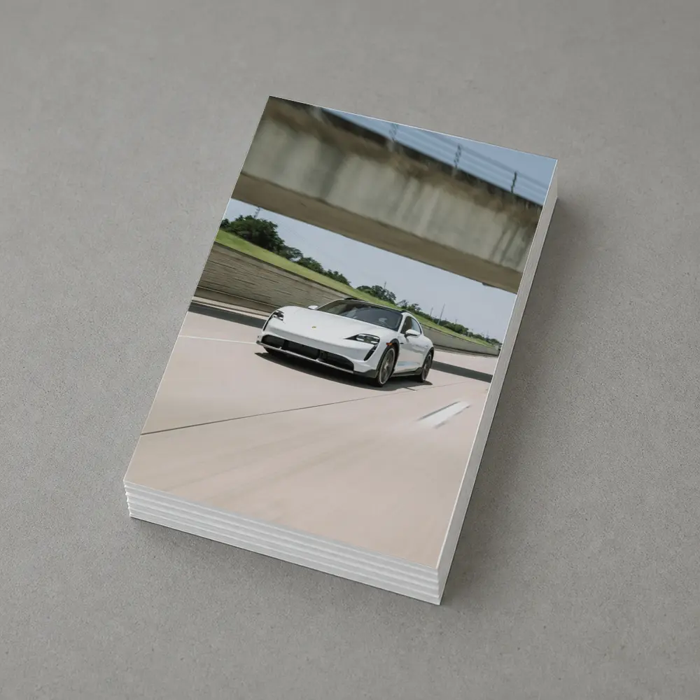 Porsche Taycan White on Open Highway – Postcards