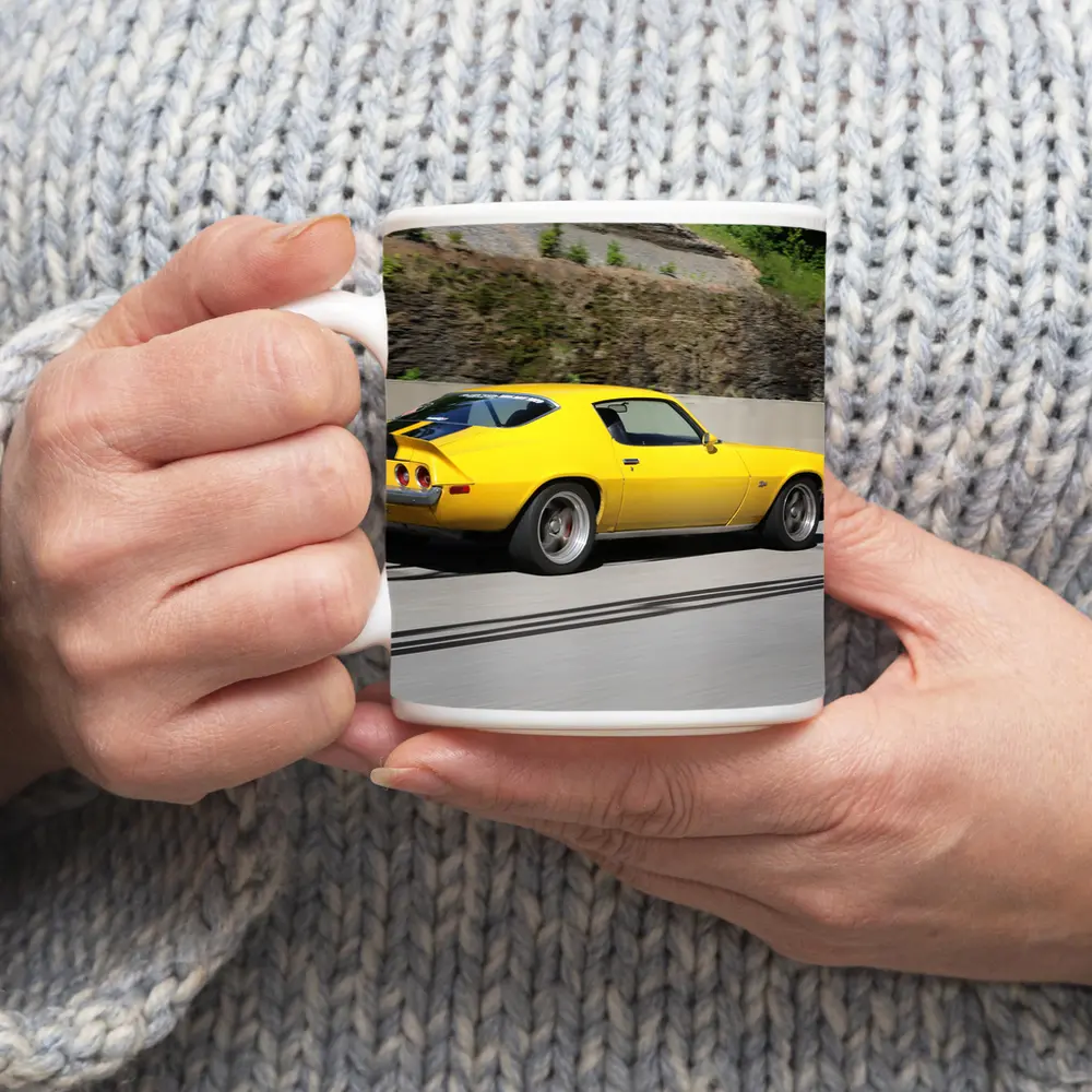 Yellow Chevrolet Camaro Z28 on Highway – Mugs