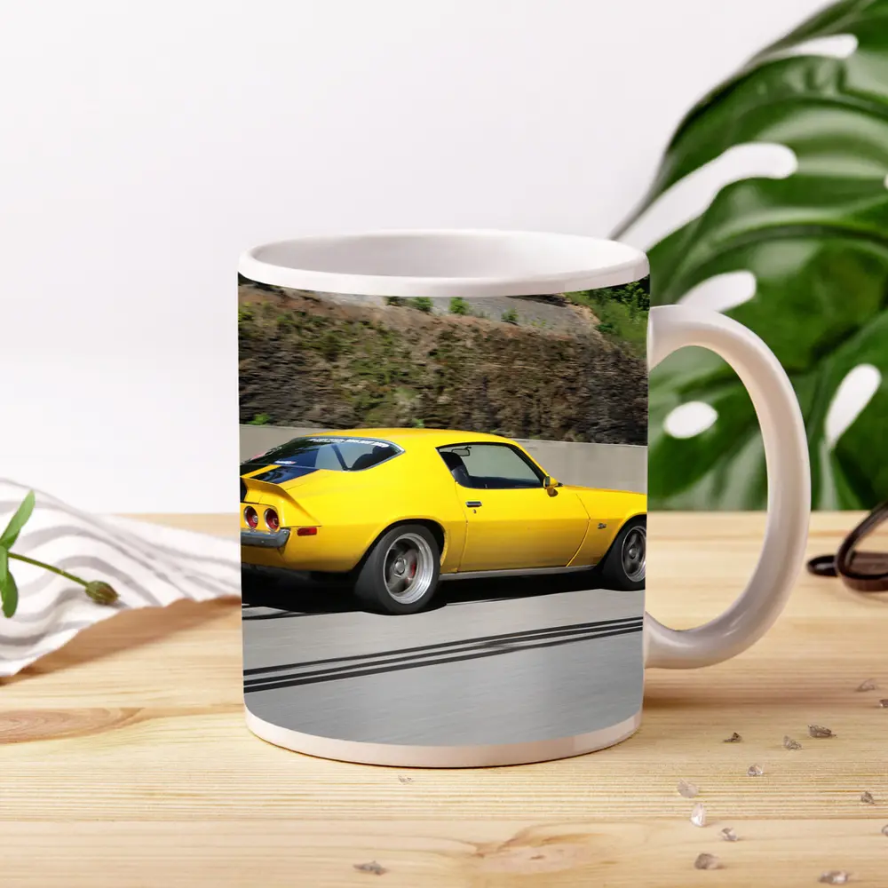 Yellow Chevrolet Camaro Z28 on Highway – Mugs