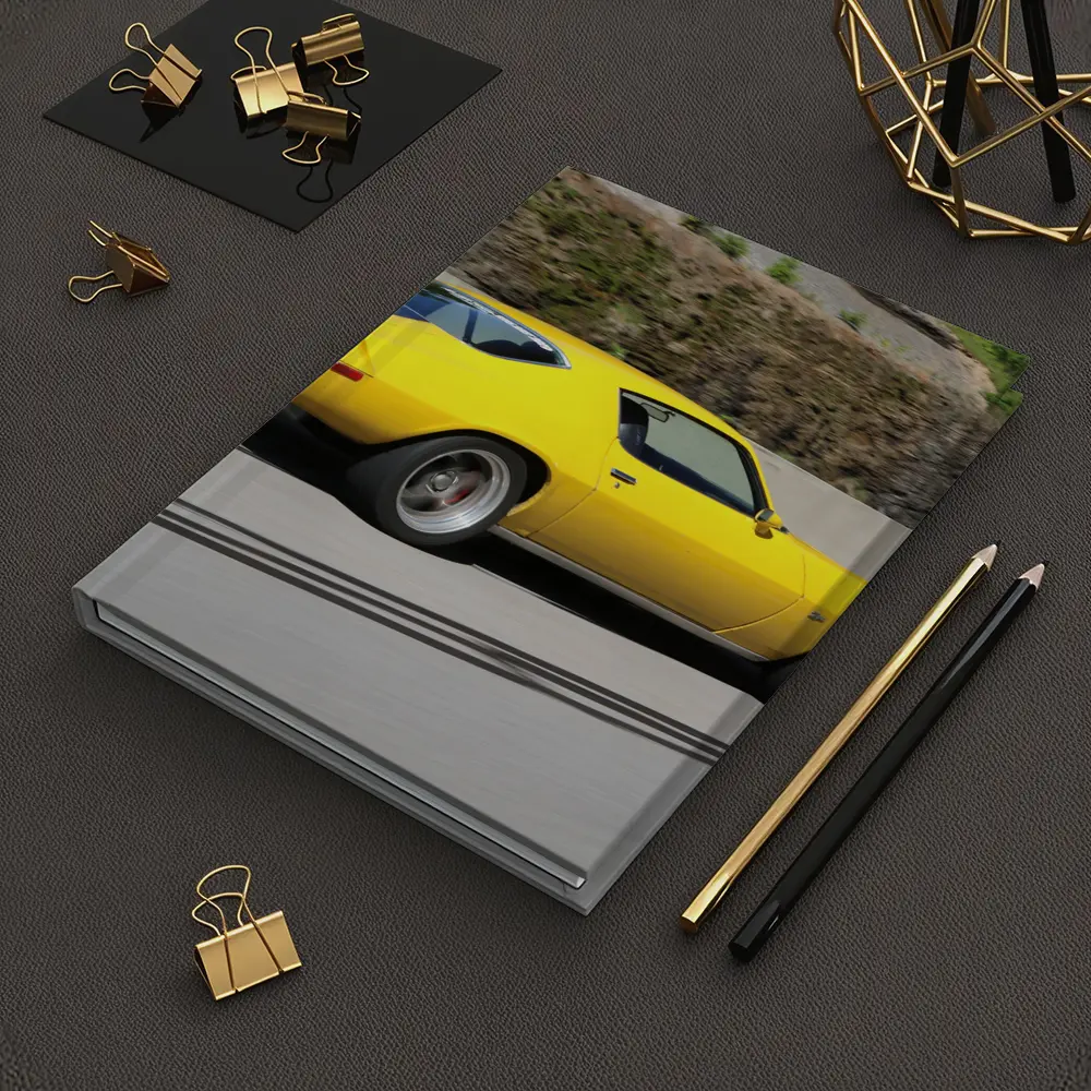 Yellow Chevrolet Camaro Z28 on Highway – Notebooks