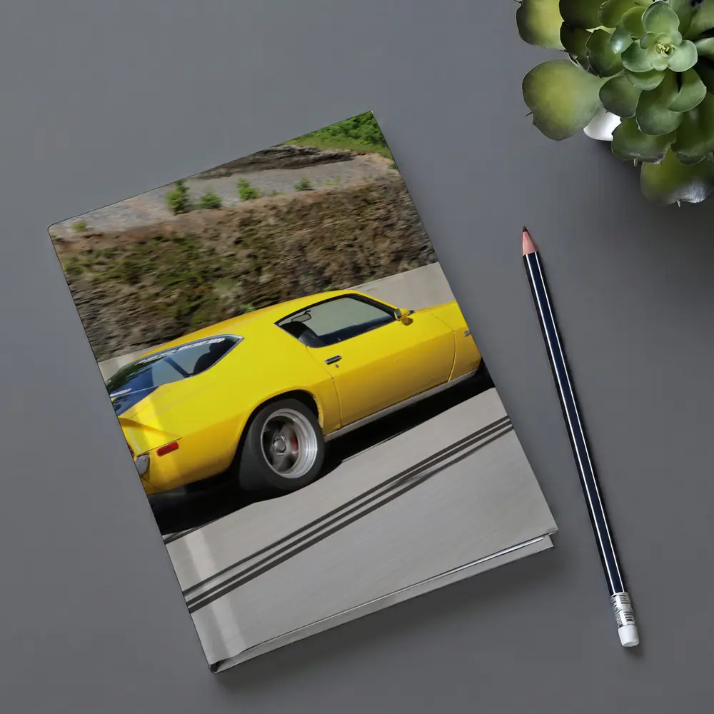 Yellow Chevrolet Camaro Z28 on Highway – Notebooks