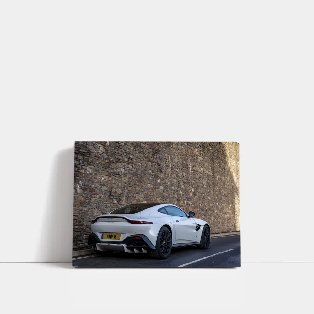 Aston Martin Vantage White Against Stone Wall – Wall Art