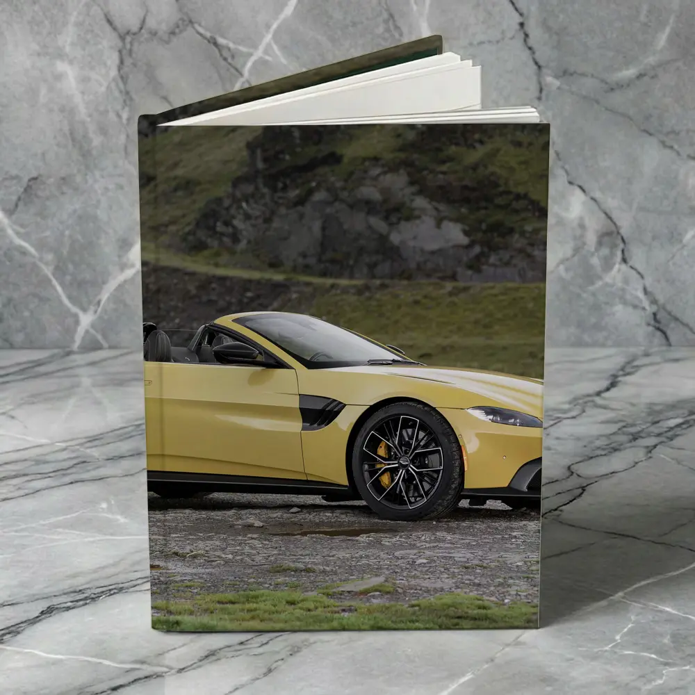 Aston Martin Vantage Roadster Yellow Rocky Landscape – Notebooks
