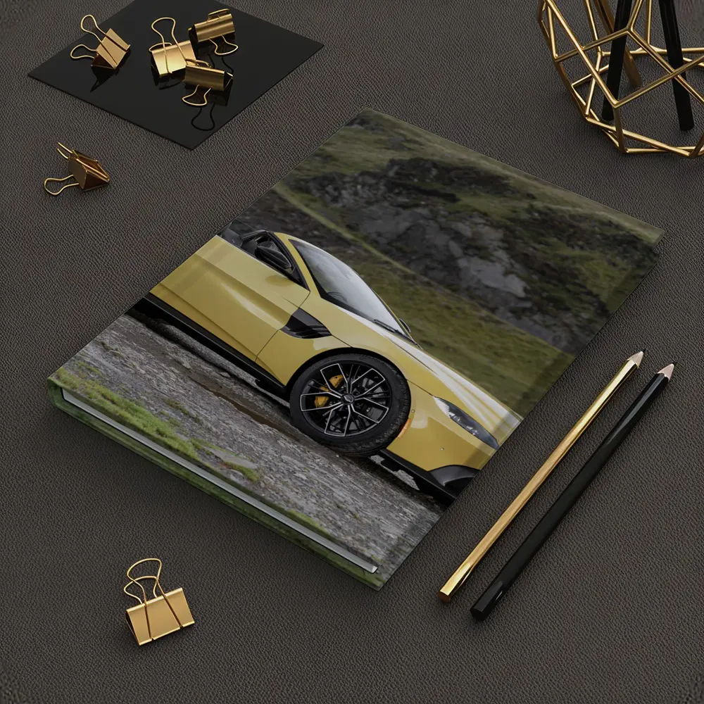 Aston Martin Vantage Roadster Yellow Rocky Landscape – Notebooks