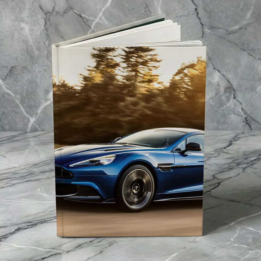 Aston Martin Vanquish Blue Speeding Road – Notebooks