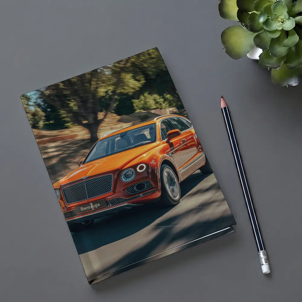 Bentley Bentayga Hybrid Orange On Road – Notebooks