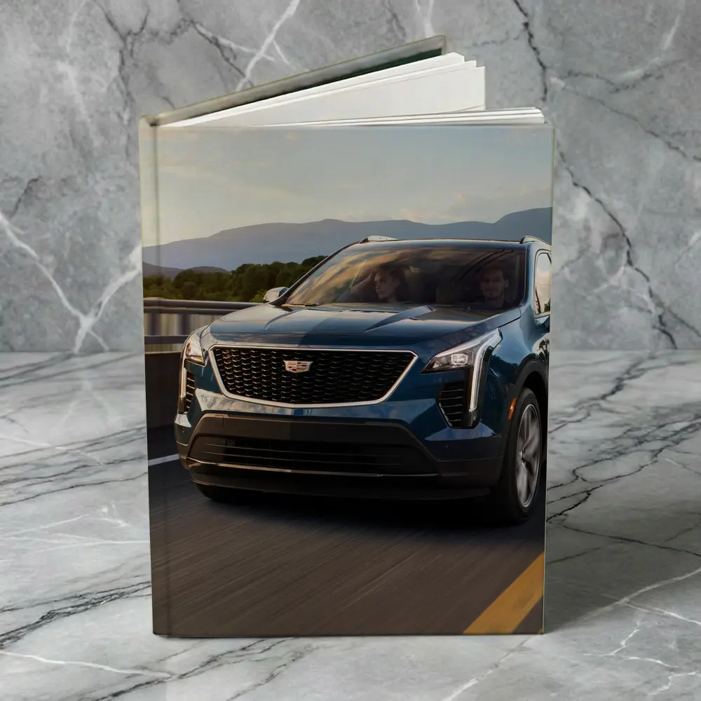 Cadillac XT4 SUV Driving Over Bridge – Notebooks
