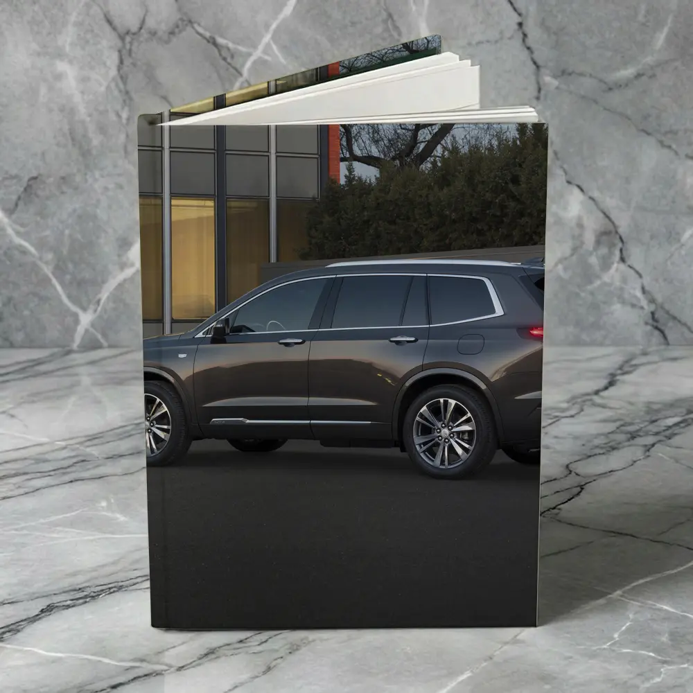 Cadillac XT6 Dark Gray SUV Urban Setting – Notebooks