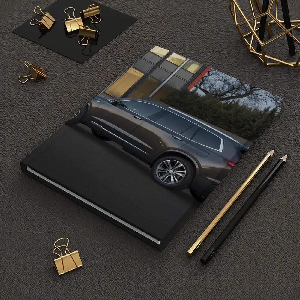 Cadillac XT6 Dark Gray SUV Urban Setting – Notebooks