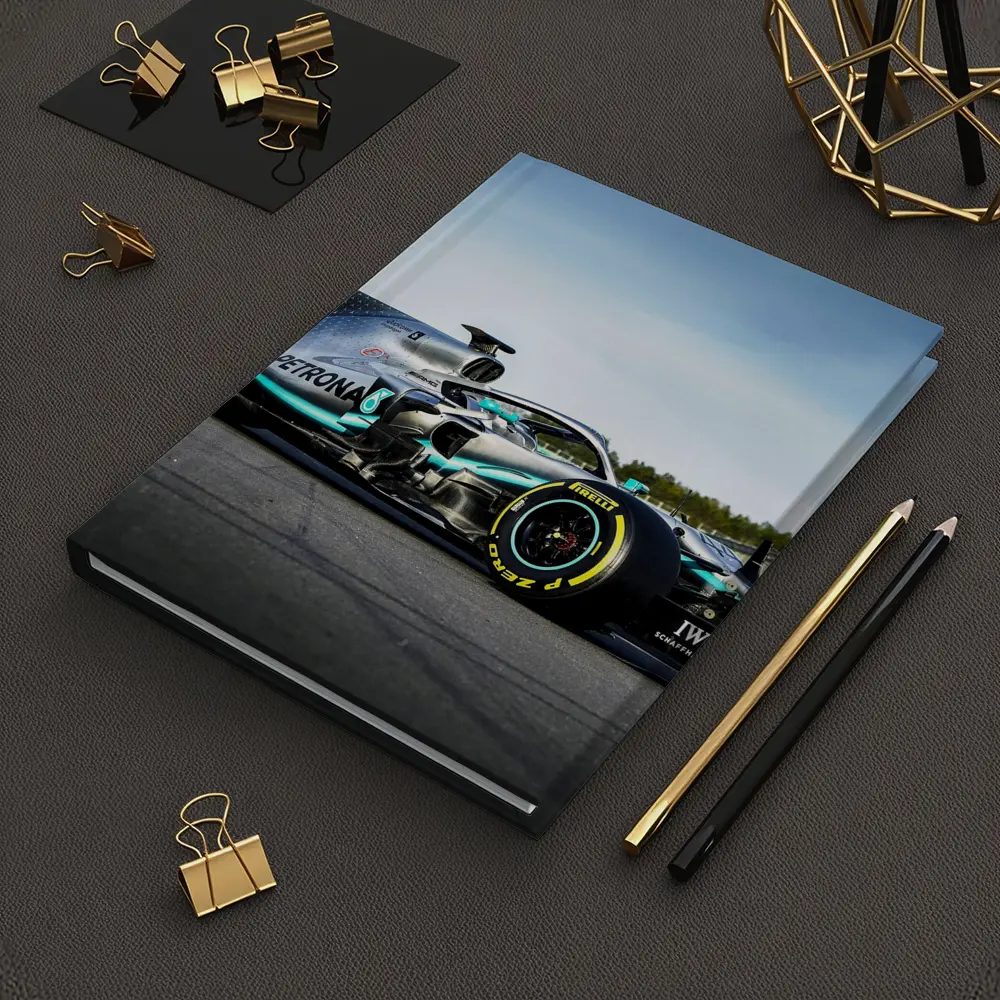 Mercedes Formula One Car on Race Track – Notebooks