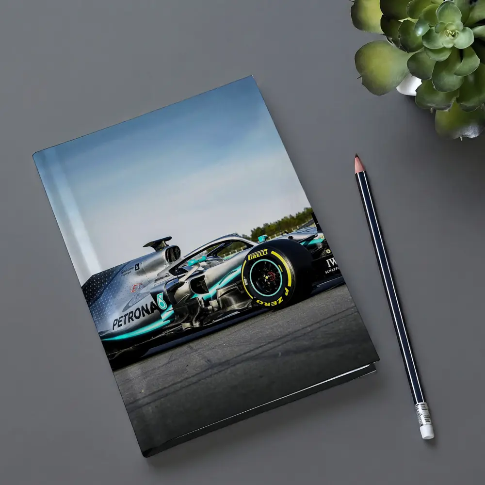 Mercedes Formula One Car on Race Track – Notebooks
