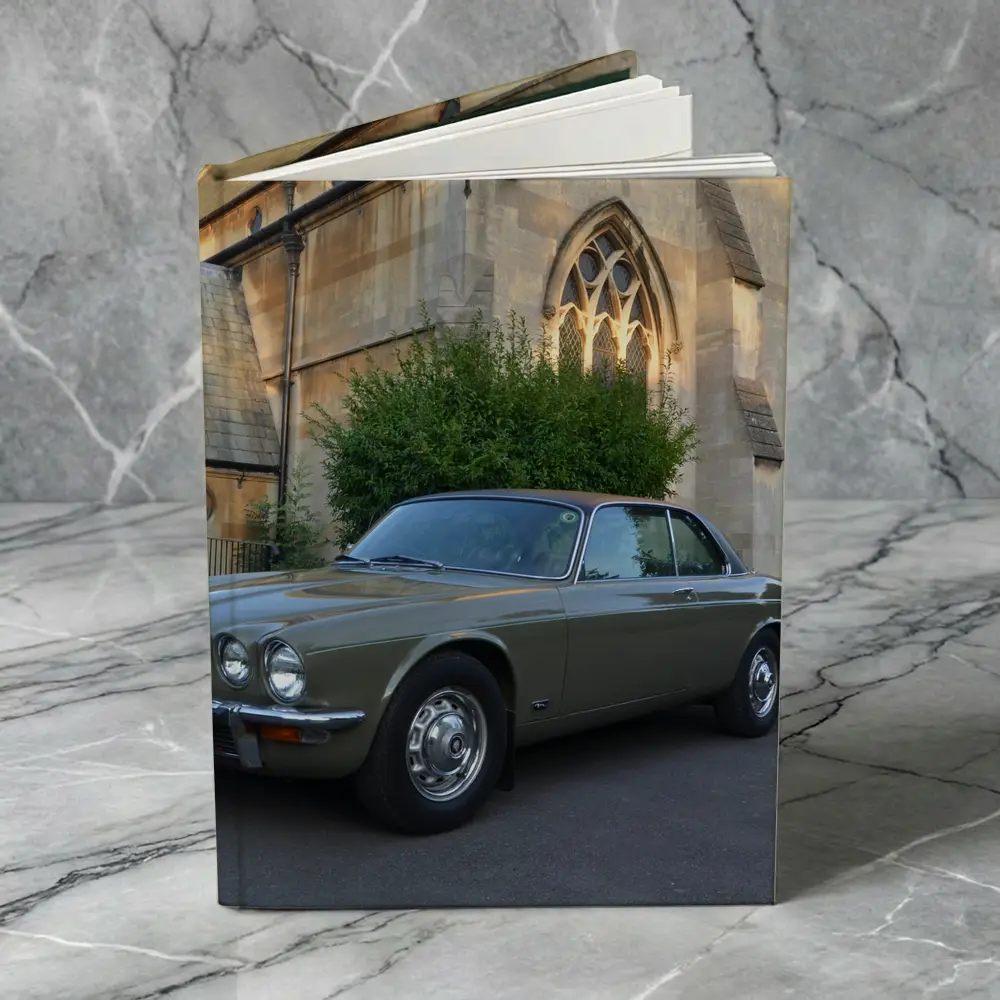 Classic Jaguar XJC Olive Green Church Background – Notebooks