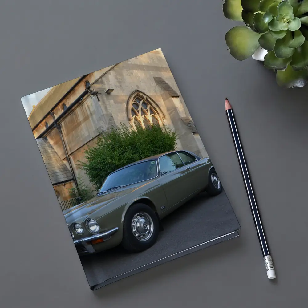 Classic Jaguar XJC Olive Green Church Background – Notebooks