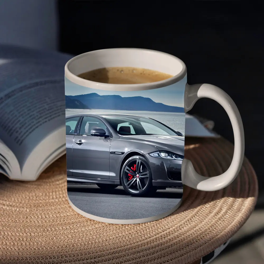 Jaguar XJ Gray Sedan Coastal Mountains Background – Mugs