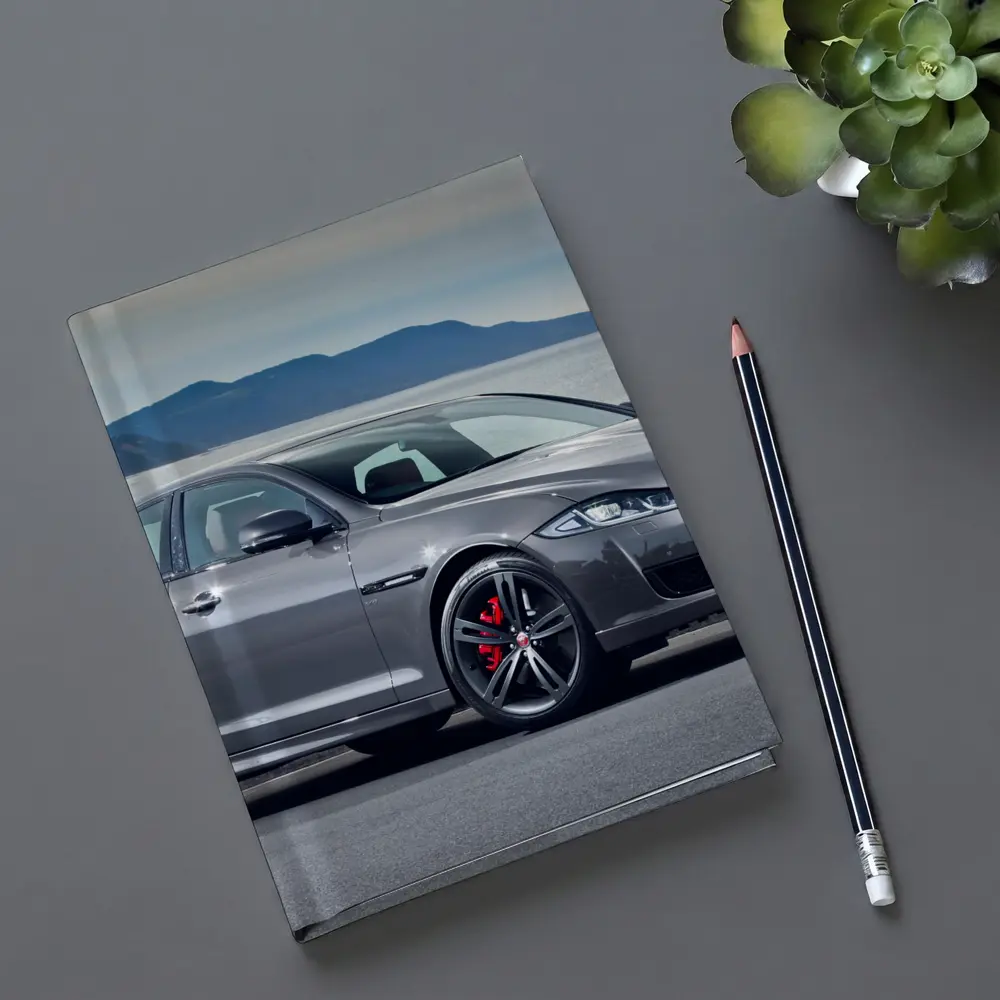 Jaguar XJ Gray Sedan Coastal Mountains Background – Notebooks