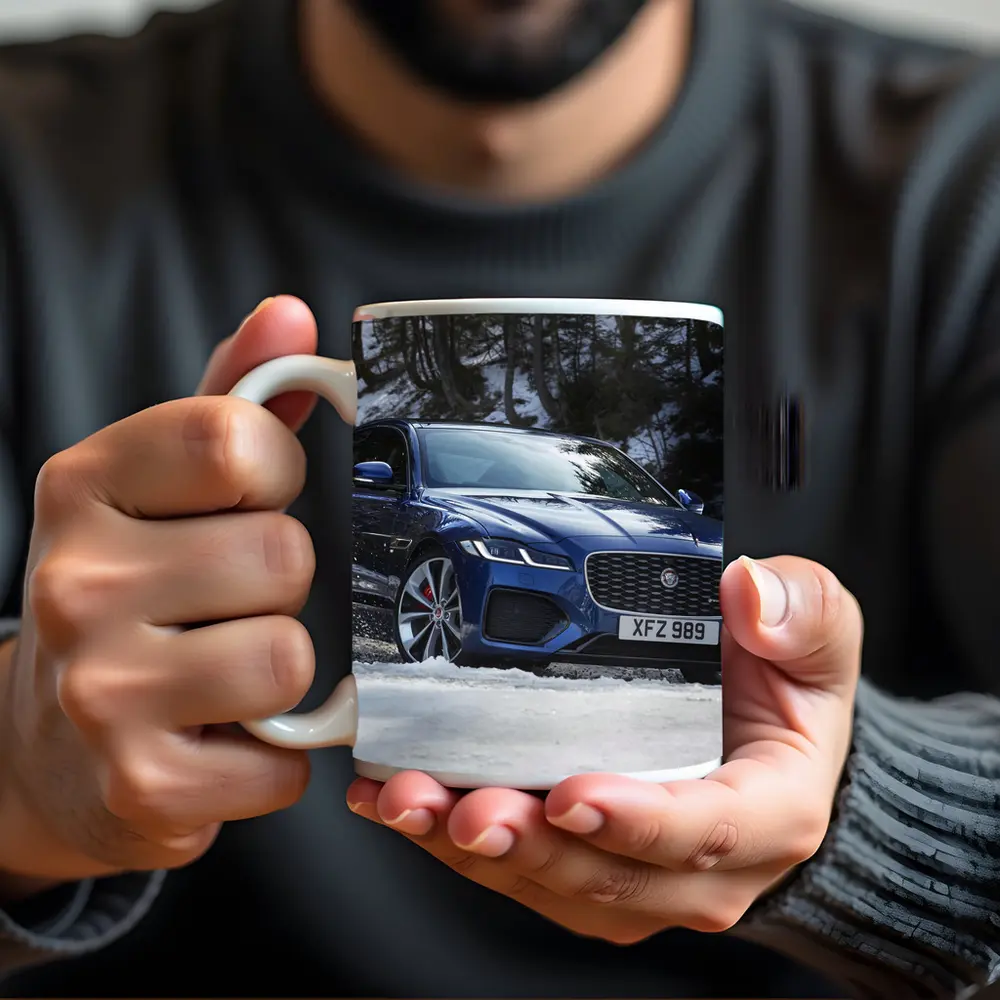 Jaguar XF Blue Sedan Driving Through Snow – Mugs