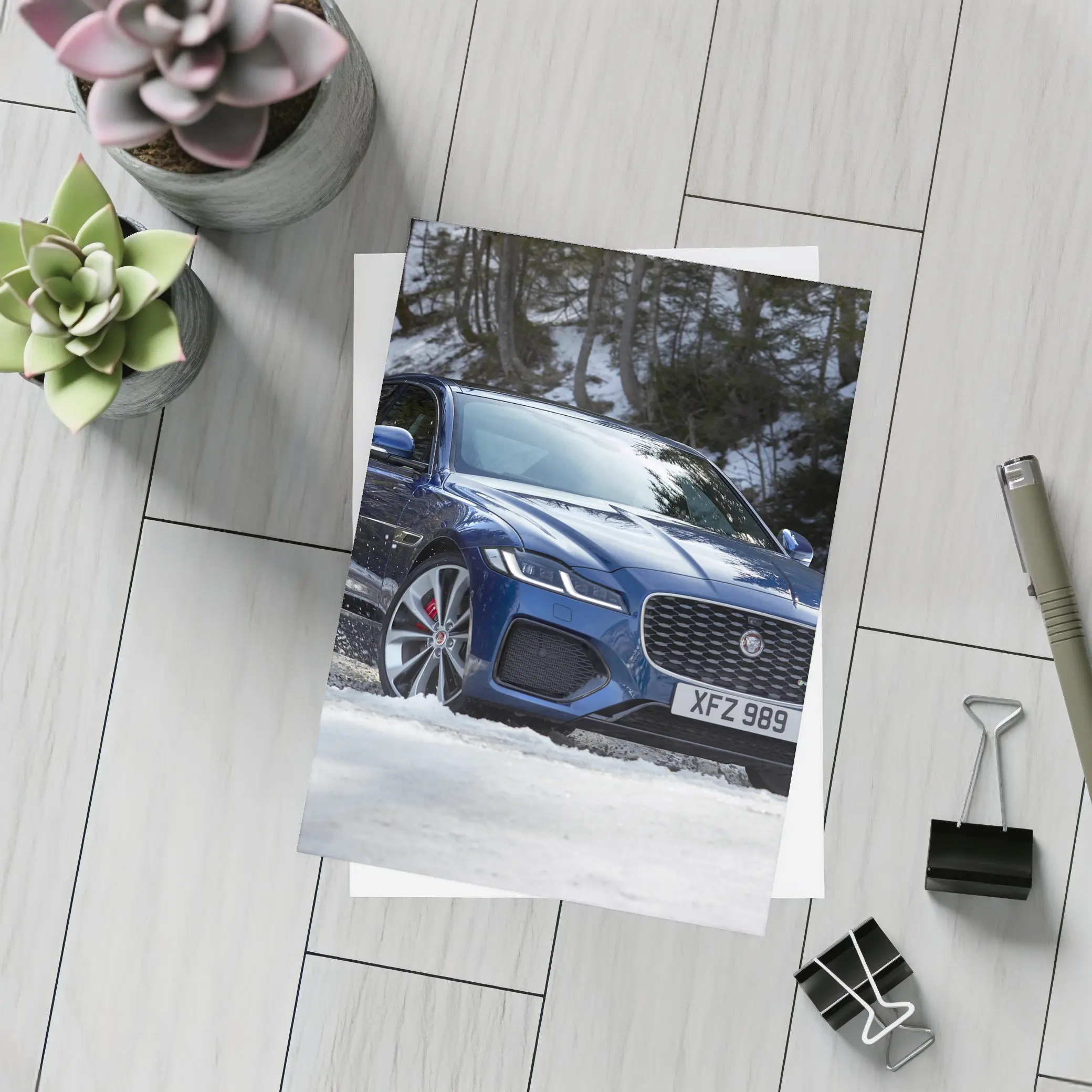Jaguar XF Blue Sedan Driving Through Snow – Postcards