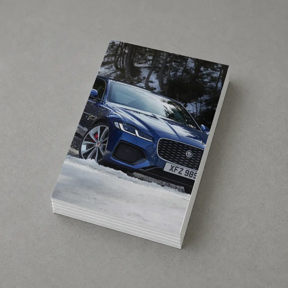 Jaguar XF Blue Sedan Driving Through Snow – Postcards