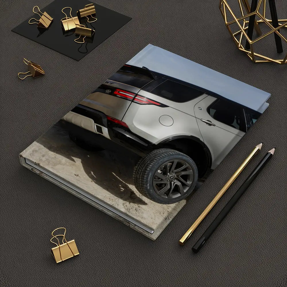 Land Rover Discovery SUV on Rocky Terrain – Notebooks