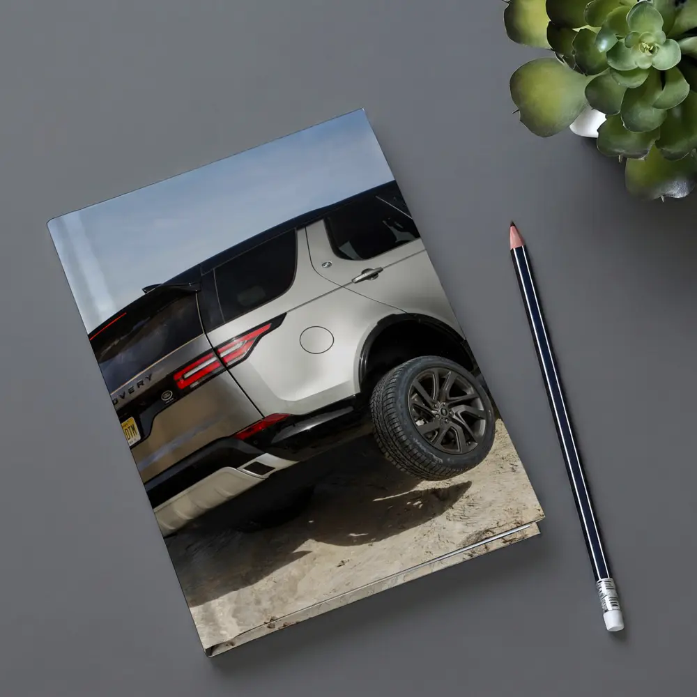 Land Rover Discovery SUV on Rocky Terrain – Notebooks